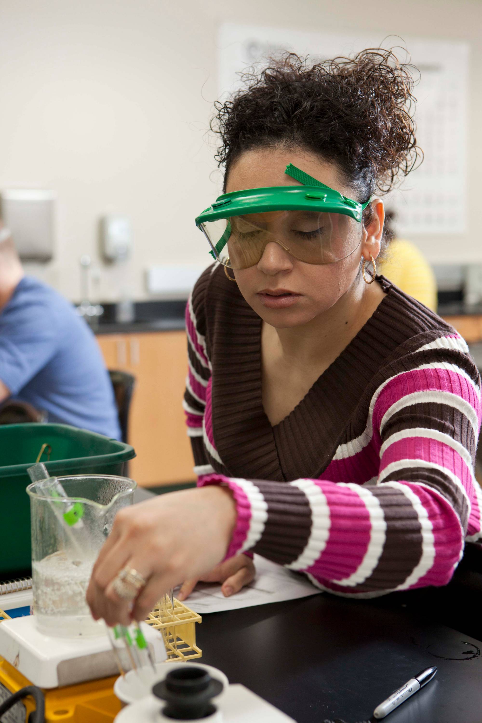 Student with test tubes